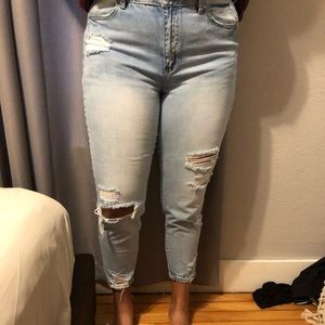 Light washed jeans with holes